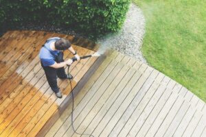 Refinishing a deck in New Jersey with power wash cleaning