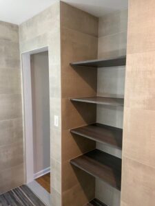 Tile shelves installed by Pink Hammer Homes in Little Falls, NJ