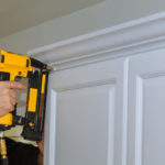 handyman installing trim